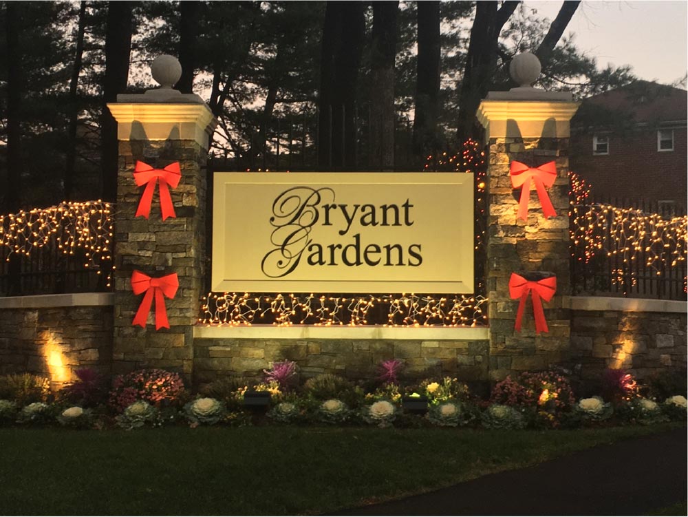 Bryant Gardens monument sign illuminated from below