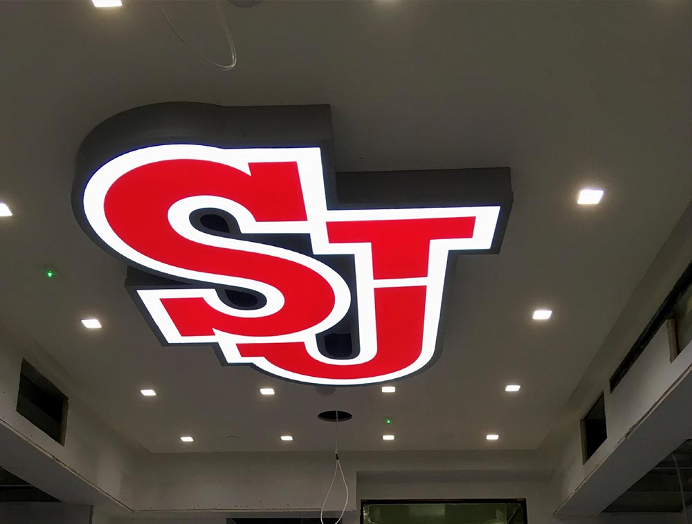 custom illuminated channel logo for Saint John’s Red Storm locker room